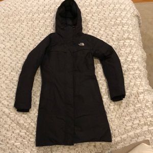 Women’s north face knee length jacket. Size M.